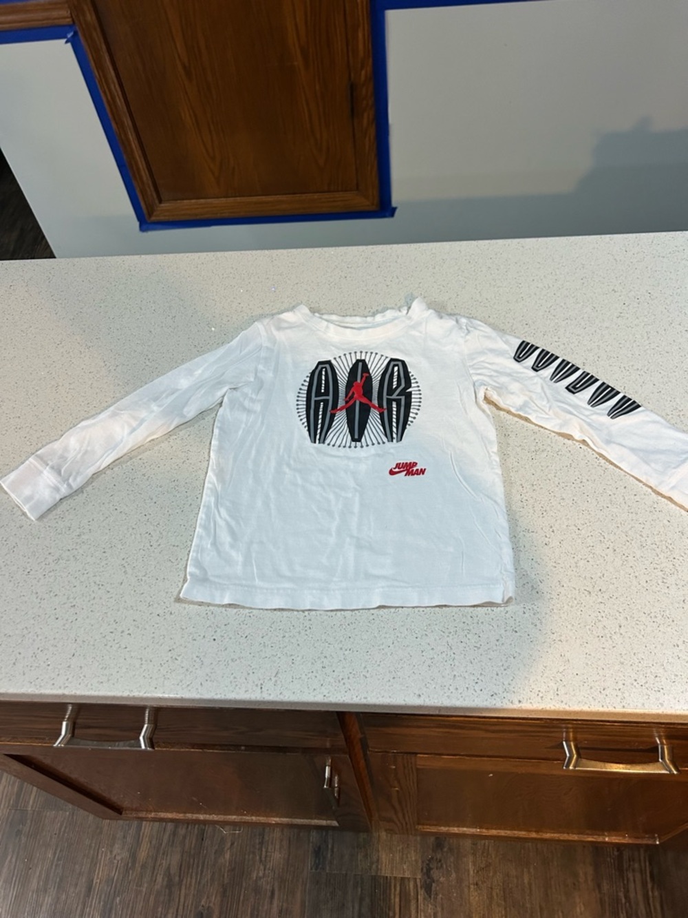 Jordan Kids White Long-Sleeve Graphic Tee with Black and Red Accents